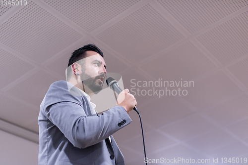 Image of successful businessman giving presentations at conference room