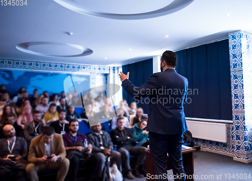 Image of successful businessman giving presentations at conference room