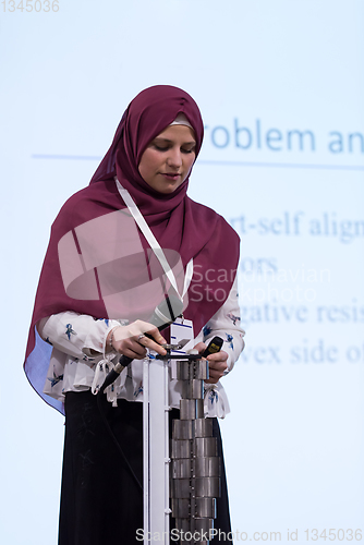 Image of Muslim businesswoman giving presentations