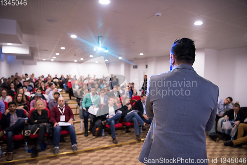 Image of successful businessman giving presentations at conference room