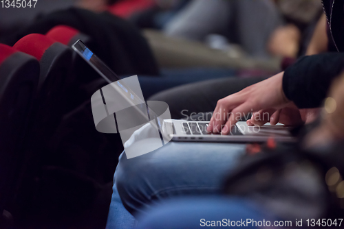 Image of business people hands using laptop computer