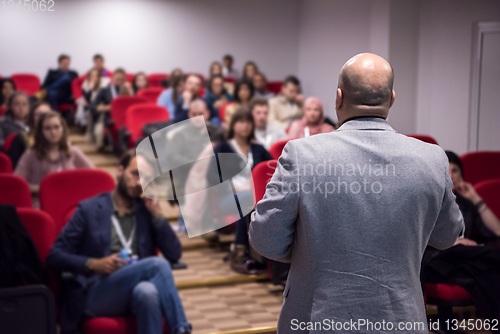 Image of successful businessman giving presentations at conference room