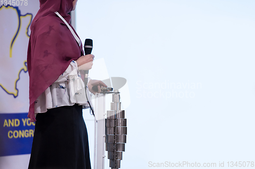 Image of Muslim businesswoman giving presentations