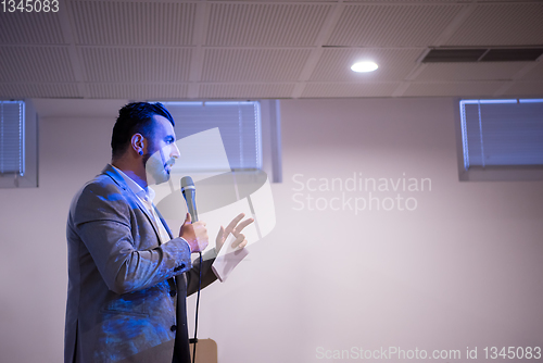 Image of successful businessman giving presentations at conference room