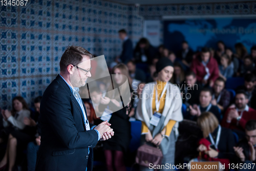 Image of successful businessman giving presentations at conference room