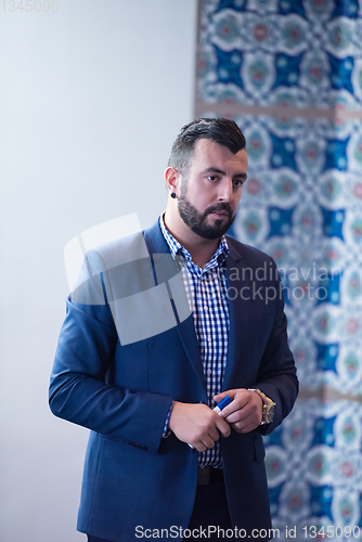 Image of successful businessman giving presentations at conference room