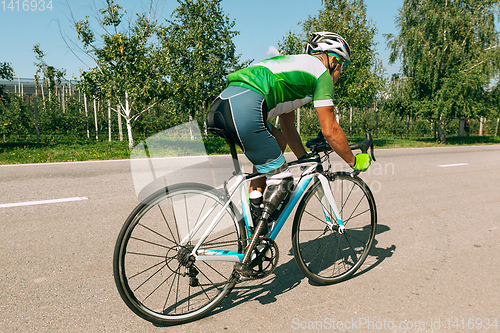 Image of Athlete disabled amputee training in cycling