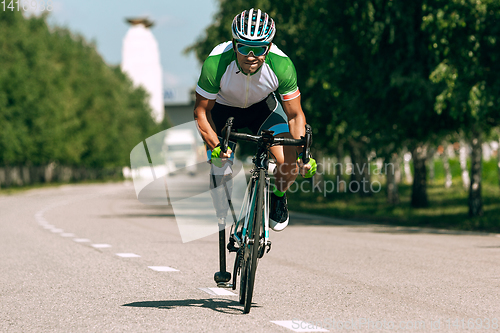 Image of Athlete disabled amputee training in cycling