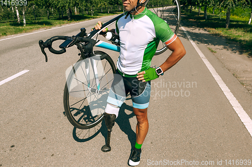 Image of Athlete disabled amputee training in cycling