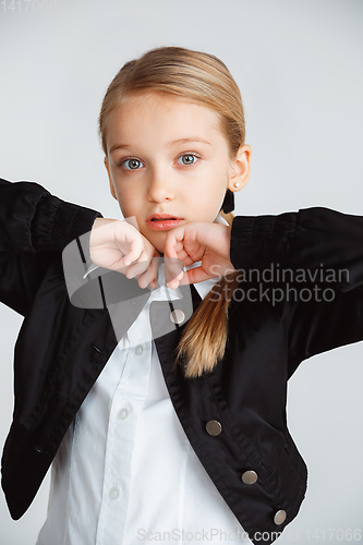 Image of Girl preparing for school after a long summer break. Back to school.