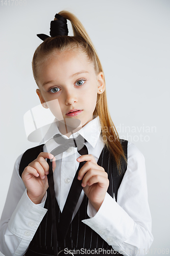 Image of Girl preparing for school after a long summer break. Back to school.