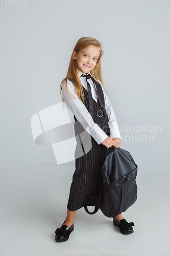 Image of Girl preparing for school after a long summer break. Back to school.