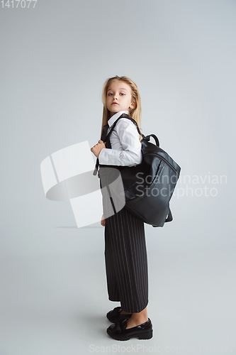 Image of Girl preparing for school after a long summer break. Back to school.