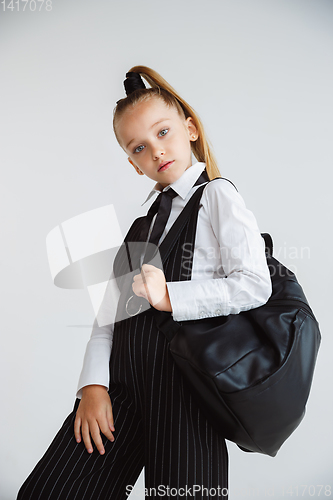 Image of Girl preparing for school after a long summer break. Back to school.