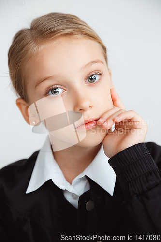 Image of Girl preparing for school after a long summer break. Back to school.