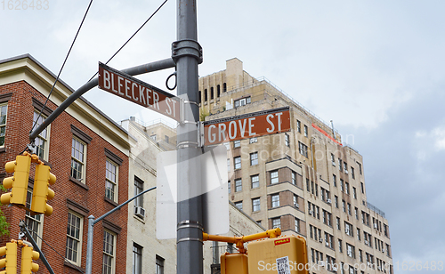 Image of Street signs in New York City for Bleecker Street and Grove Stre