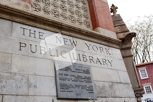 Image of Exterior carved signage of Jefferson Market Library in New York 