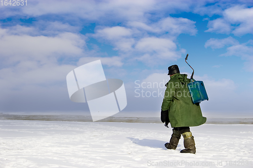 Image of Ice Fisherman going away