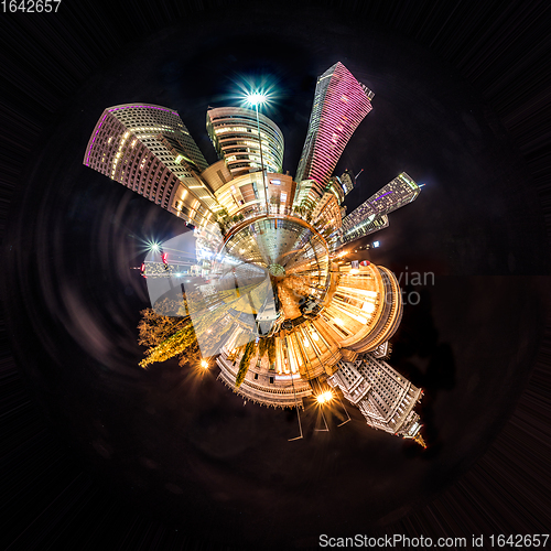 Image of Miniature planet Warsaw - Night skyline with soviet era and modern skyscrapers