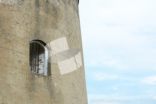 Image of Window with metal bars in the thick wall of Wish Tower in Eastbo