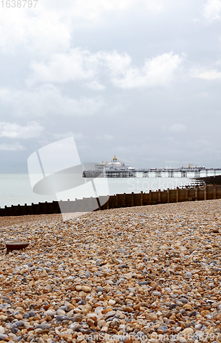 Image of Eastbourne pleasure pier above a calm sea on the East Sussex coa