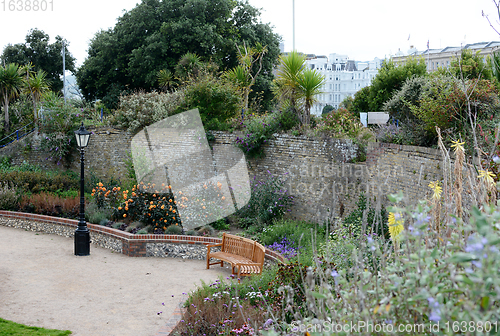 Image of Attractive walled gardens full of flowers and shrubs around Wish