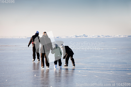 Image of Family ice skating