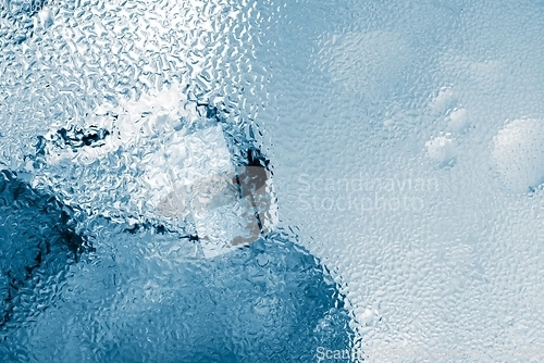 Image of Ice cubes as background texture closeup photo