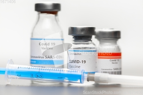 Image of Vaccine for virus in small bottles