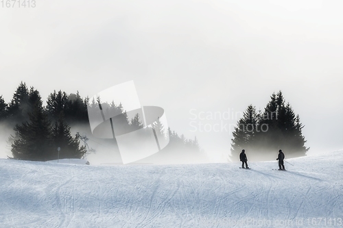 Image of Foggy ski path with slopes