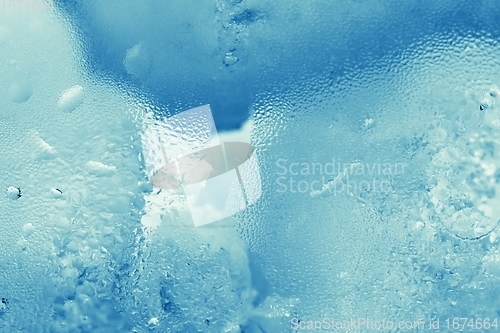 Image of Ice cubes as background texture closeup photo