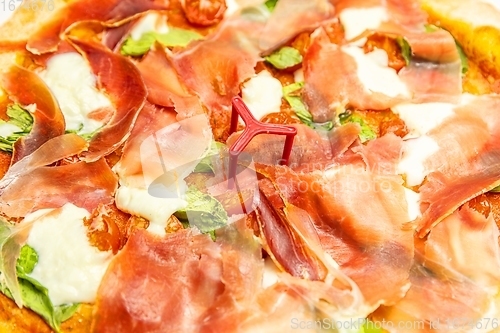 Image of Delicious pizza surface with chease and meat
