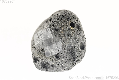 Image of Smoke whirling around small meteorite stone