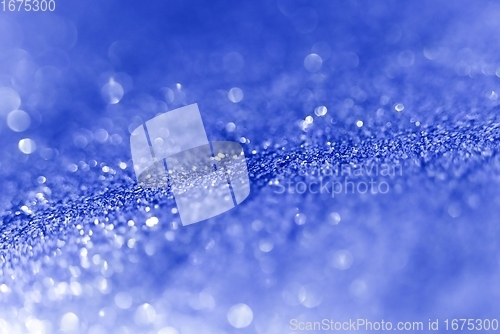 Image of Smooth colorful liquid flowing as background texture