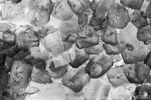 Image of Ice cubes as background texture closeup photo