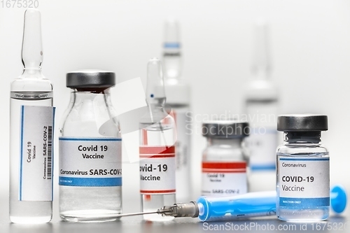 Image of Vaccine for virus in small bottles