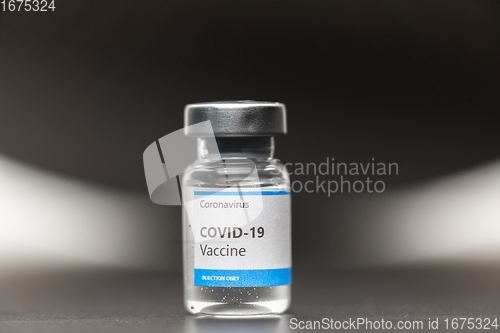 Image of Vaccine for virus in small bottles