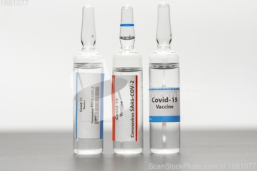 Image of Vaccine for virus in small bottles