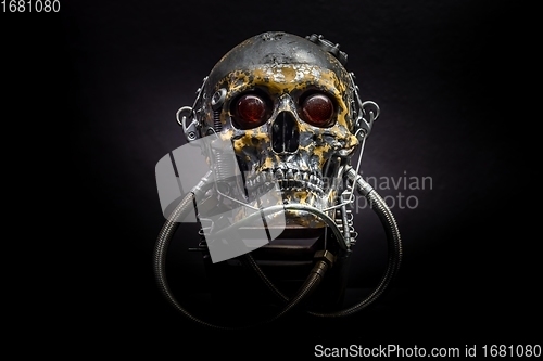 Image of Spooky dark black skull aginast dark background