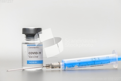 Image of Vaccine for virus in small bottles