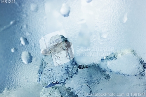 Image of Ice cubes as background texture closeup photo