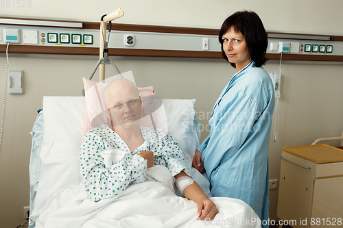 Image of woman patient with cancer in hospital with friend