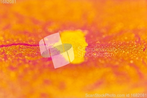 Image of Smooth colorful liquid flowing as background texture