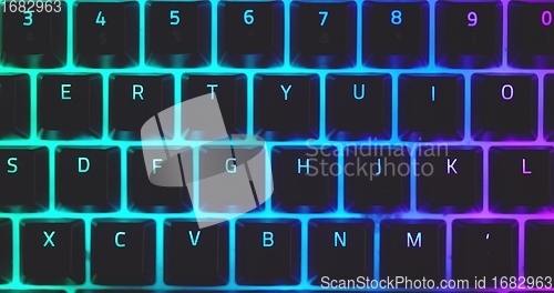 Image of illuminated mechanical keyboard closeup photo