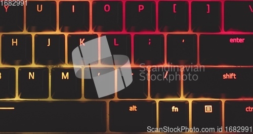 Image of illuminated mechanical keyboard closeup photo