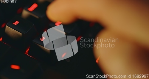 Image of illuminated mechanical keyboard closeup photo