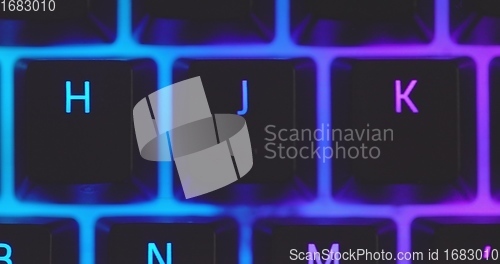 Image of illuminated mechanical keyboard closeup photo