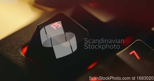 Image of illuminated mechanical keyboard closeup photo