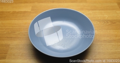 Image of Empty bowl on the table closeup photo
