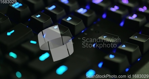 Image of illuminated mechanical keyboard closeup photo